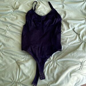 Thong body suit